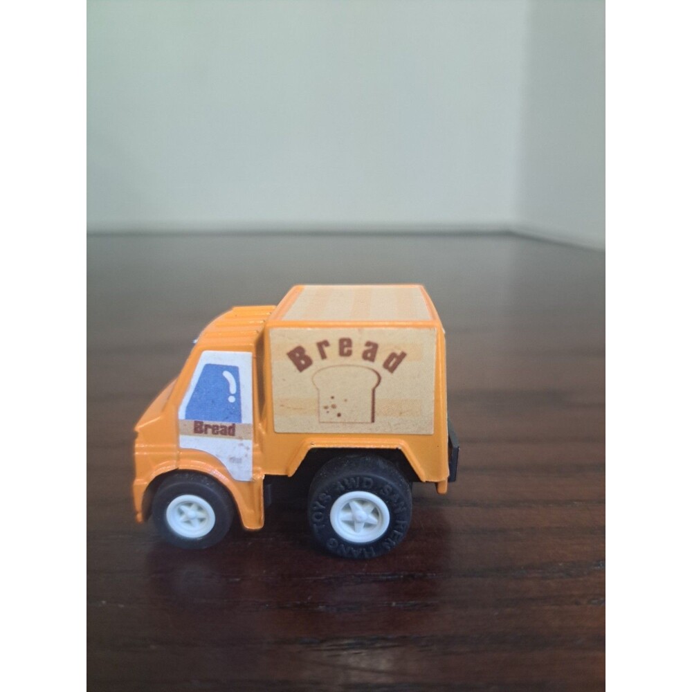 Vintage San Ren Hang Orange Bread Truck Pull Back Racer